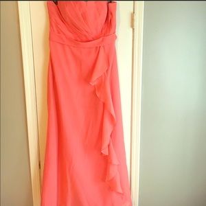 Coral bridesmaid/prom dress with chiffon overlay.